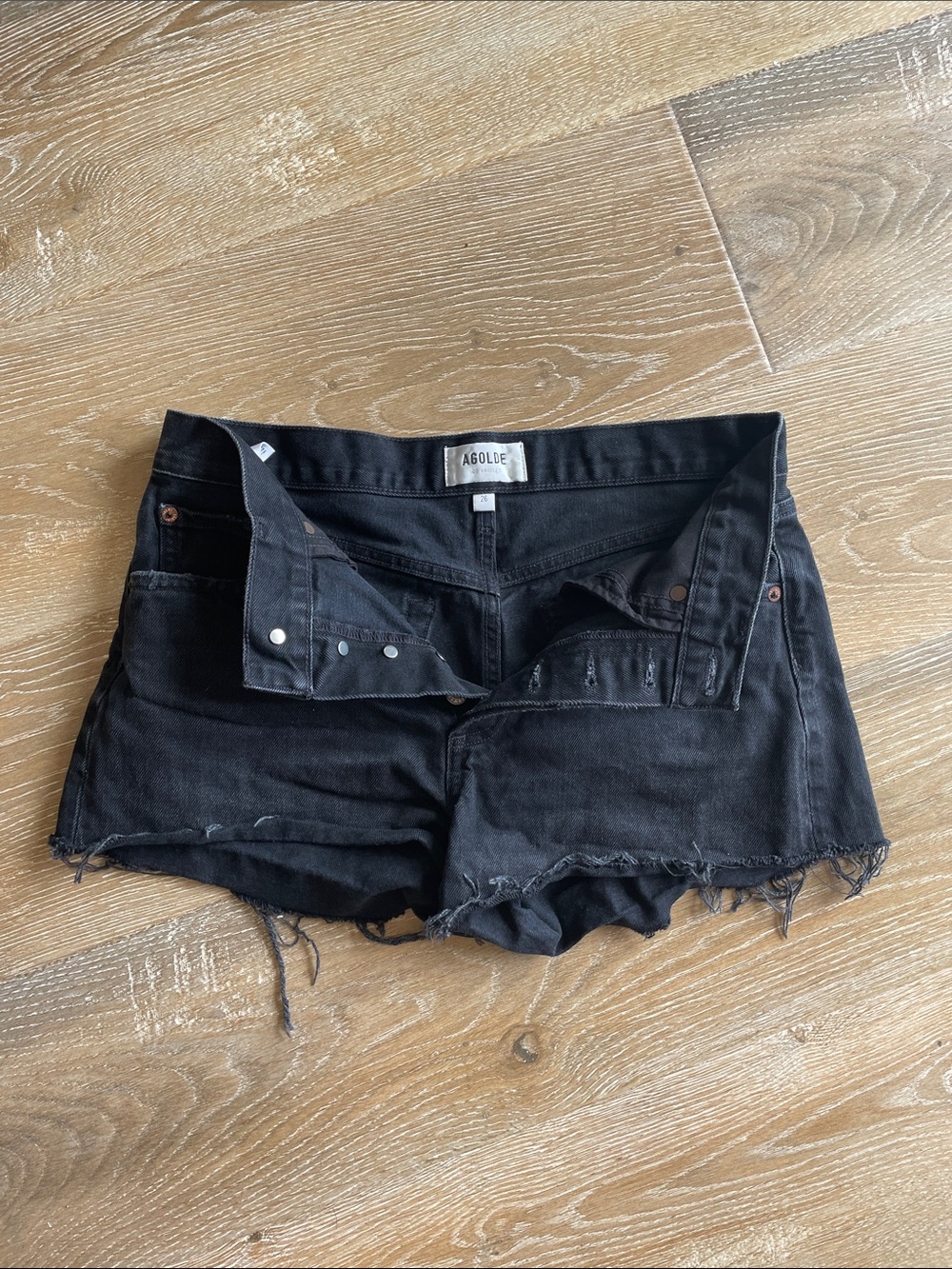 Agolde Black Frayed Denim Cutoff Shorts